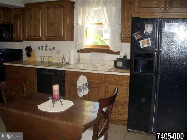 1841 Jefferson Road Spring Grove, PA 17362 - Photo 5 of 16 a kitchen with a table and chairs in it
