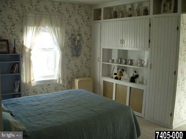 1841 Jefferson Road Spring Grove, PA 17362 - Photo 9 of 16 a bedroom with a bed and a window