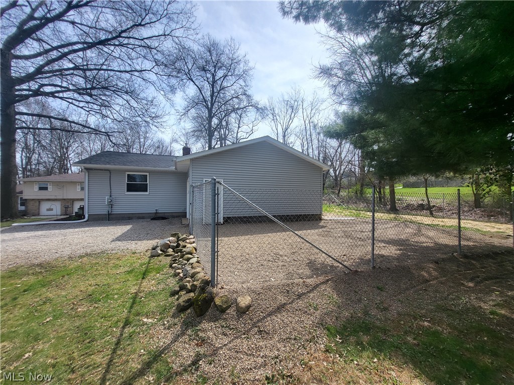 3260 Mogadore Road Akron, OH 44312 - Photo 14 of 20 Back of house with a garage