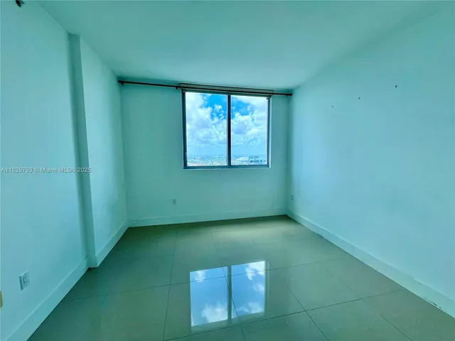 an empty room with a window