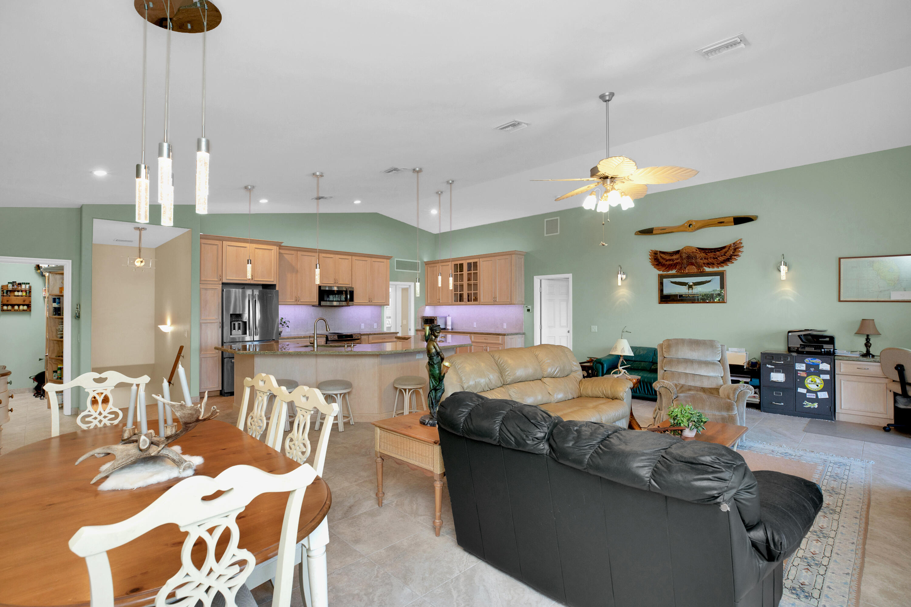 100 South Airport Road Tavernier, FL 33070 - Photo 13 of 42 a living room with furniture and kitchen view