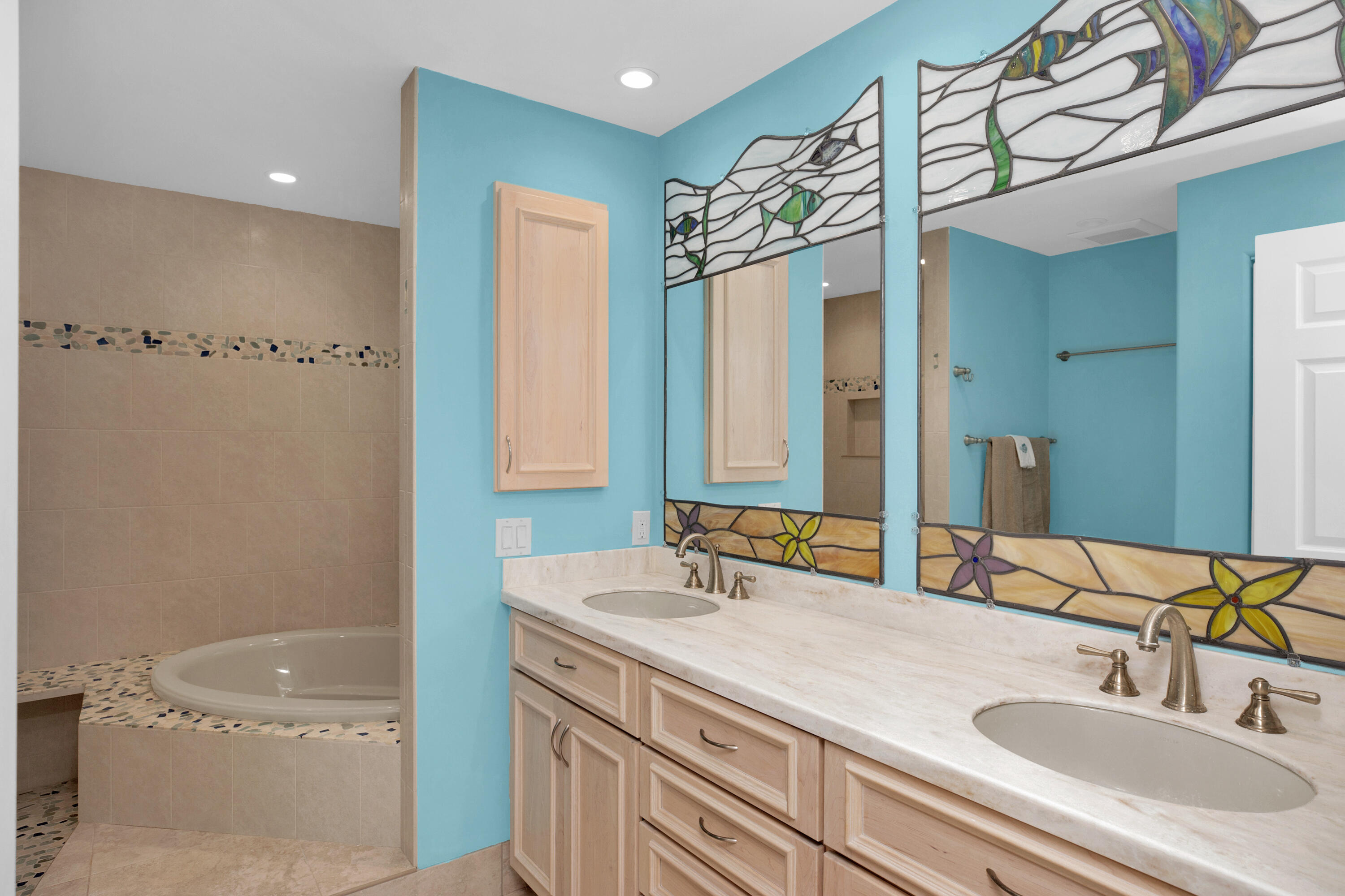 100 South Airport Road Tavernier, FL 33070 - Photo 20 of 42 a bathroom with a granite countertop sink a mirror and a bathtub