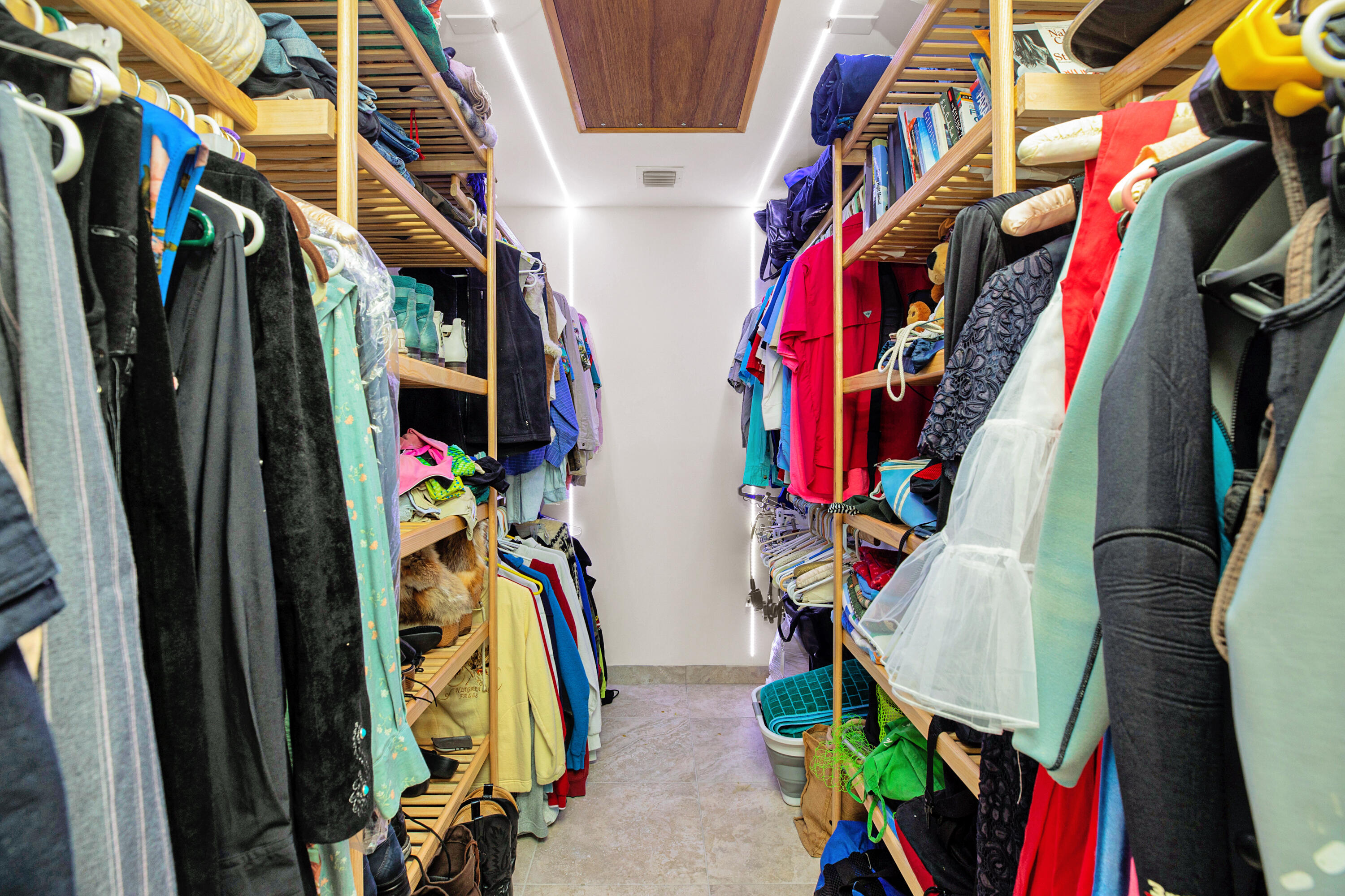 100 South Airport Road Tavernier, FL 33070 - Photo 23 of 42 a view of walk in closet with clothes