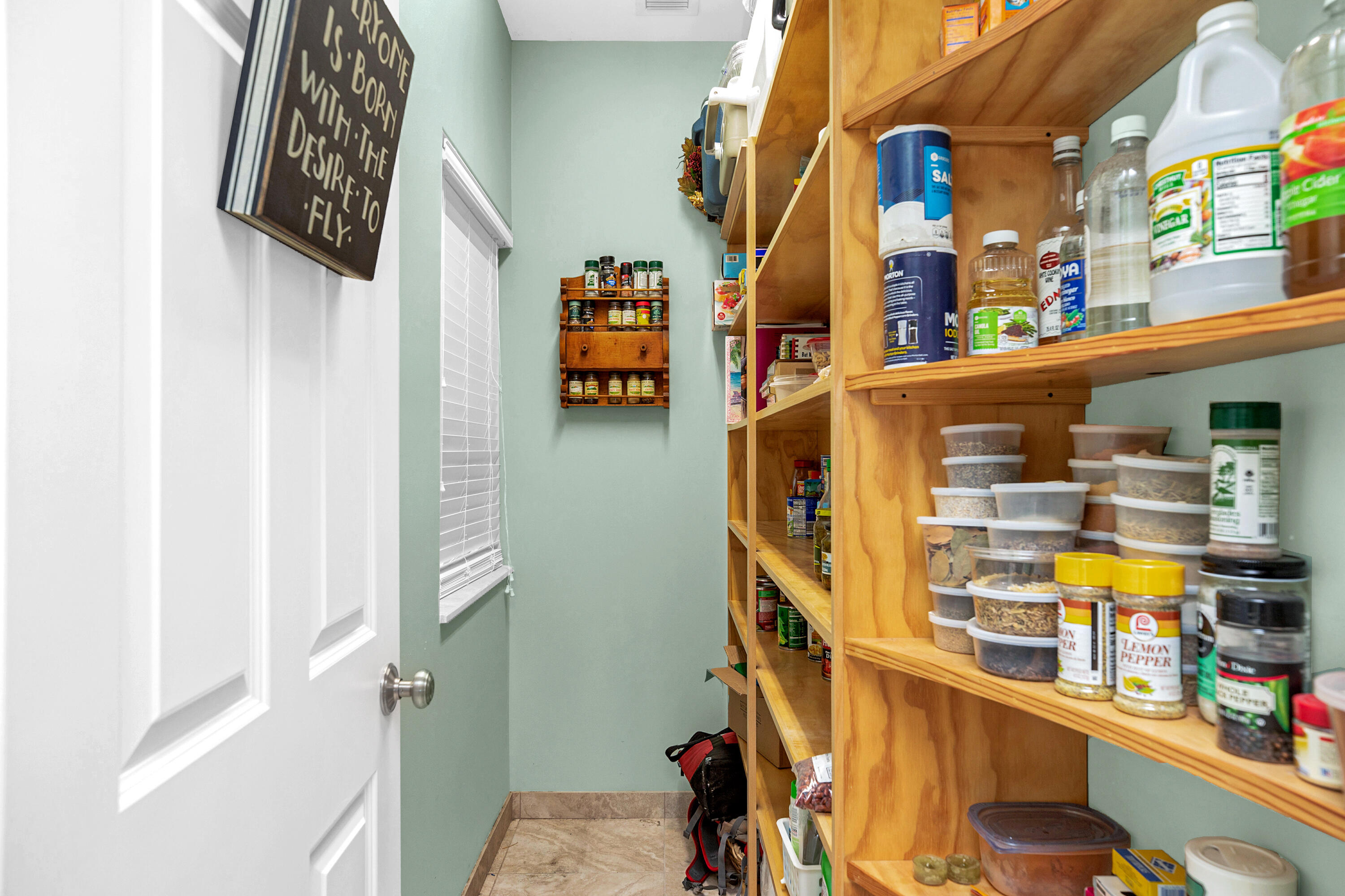 100 South Airport Road Tavernier, FL 33070 - Photo 31 of 42 a close up of a kitchen with storage and utility