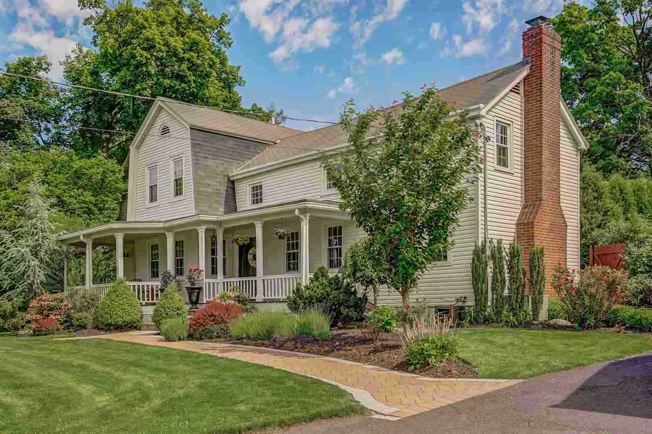 965 Closter Dock Road Alpine, NJ 07620 - Photo 1 of 1 front view of a house with a yard