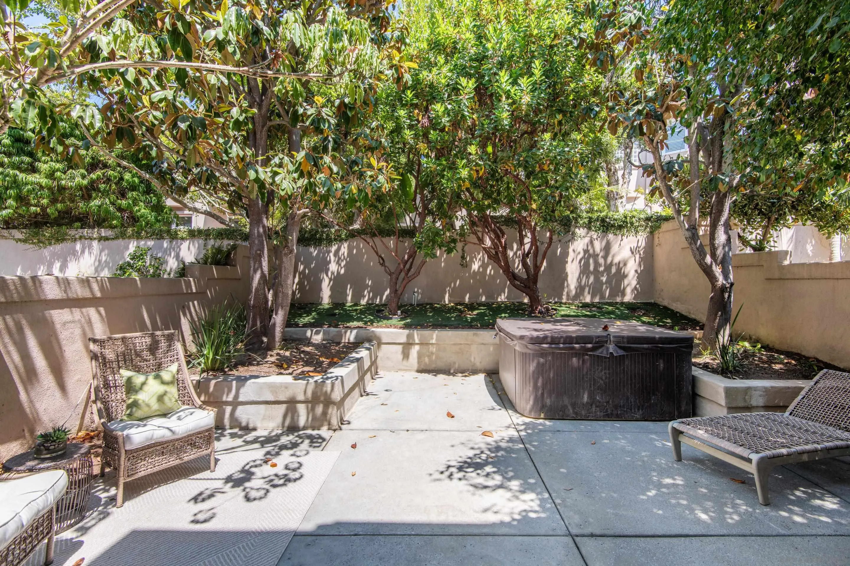 9767 Claiborne Square La Jolla, CA 92037 - Photo 26 of 50 a view of a backyard with sitting area