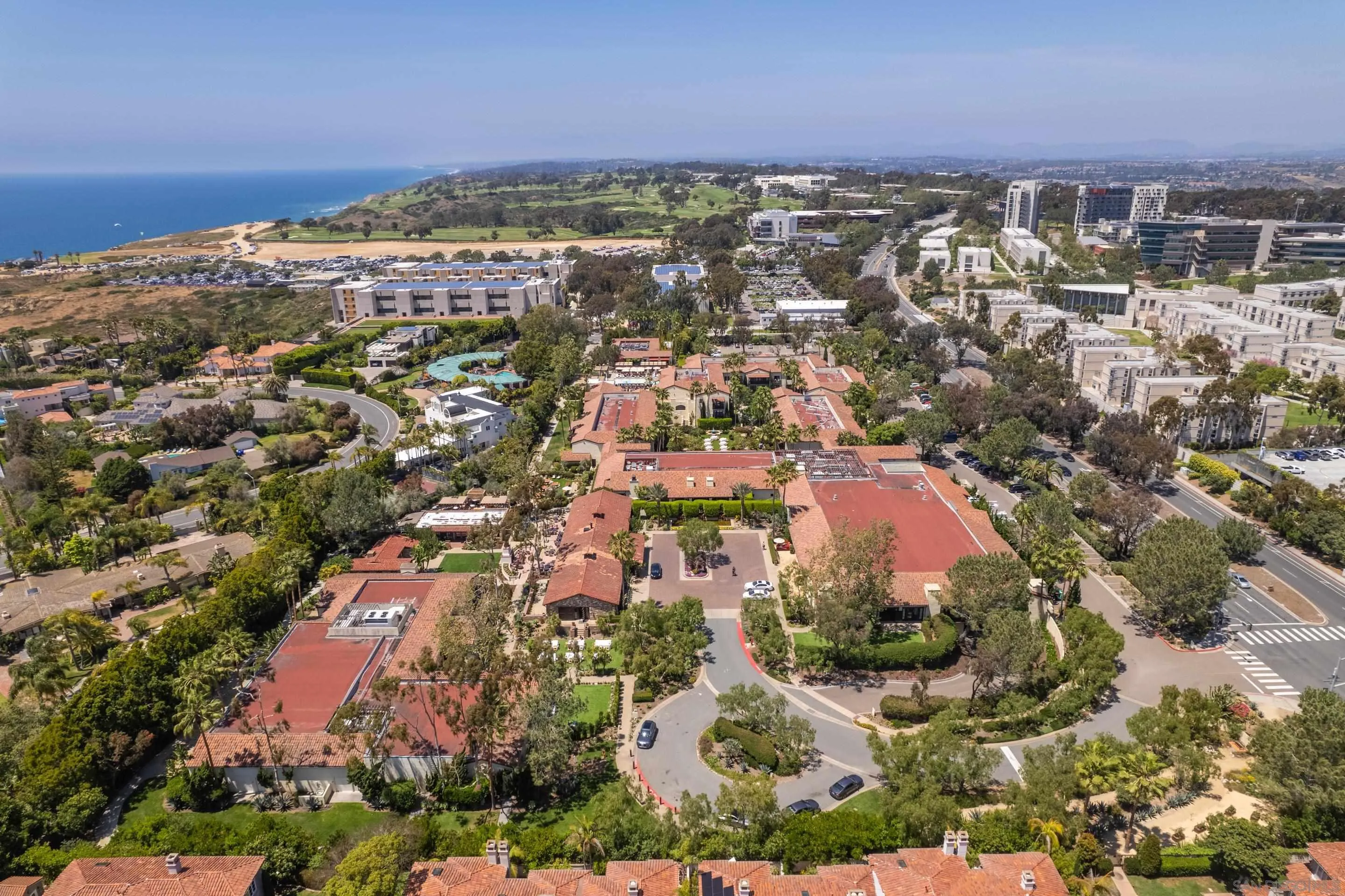 9767 Claiborne Square La Jolla, CA 92037 - Photo 32 of 50 an aerial view of residential houses with outdoor space and trees