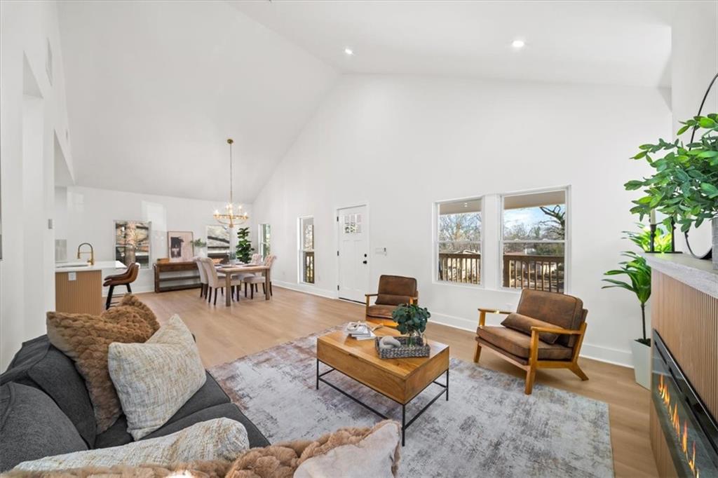 1523 Melrose Drive Southwest Atlanta, GA 30310 - Photo 5 of 33 a living room with furniture a table and a potted plant