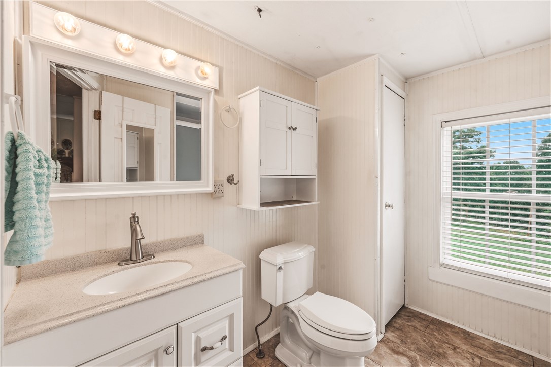 942 Chambers Hill Road Seneca, SC 29672 - Photo 17 of 38 A well-appointed bathroom offers a vanity with ample counter space and natural light from a generous window.