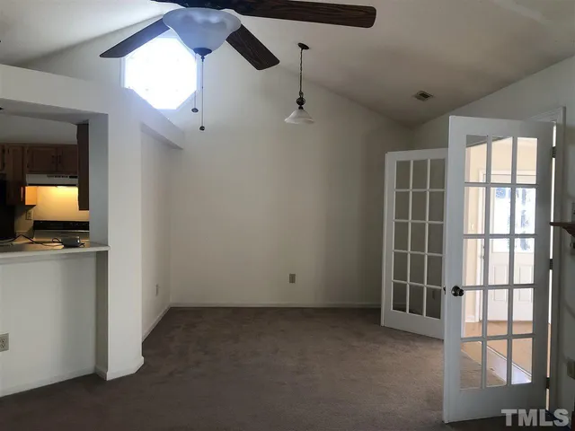 an empty room with windows