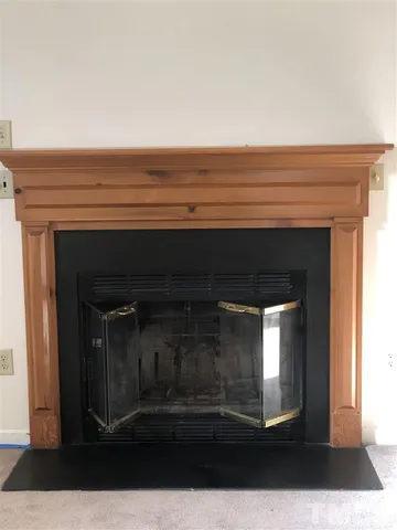 a living room with a fireplace