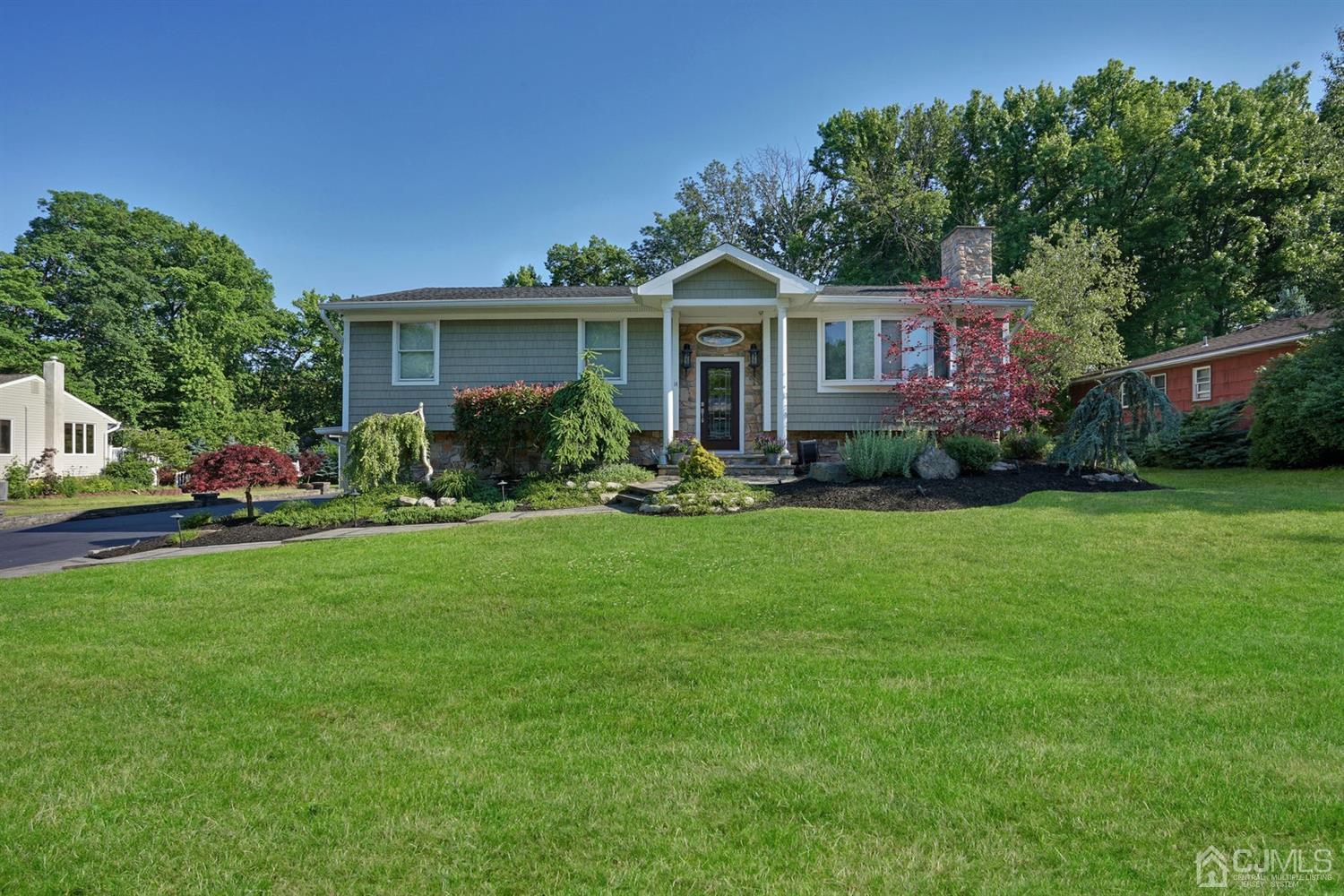 14 Fishel Road Edison, NJ 08820 - Photo 2 of 46 a front view of house with yard and green space
