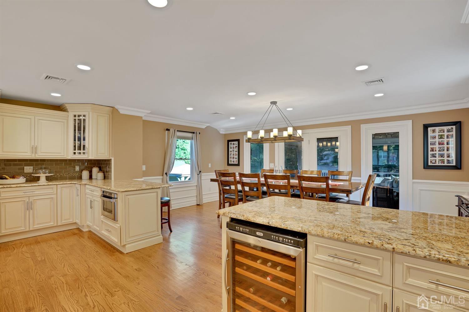 14 Fishel Road Edison, NJ 08820 - Photo 11 of 46 a kitchen with stainless steel appliances granite countertop a stove and a sink