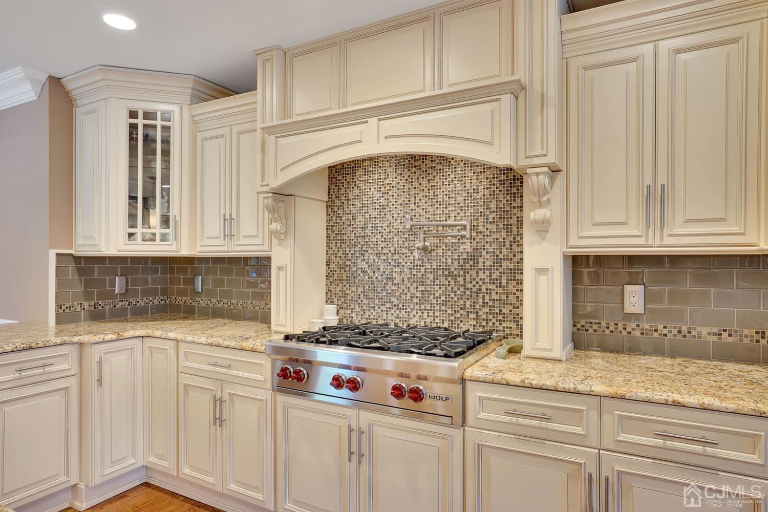 14 Fishel Road Edison, NJ 08820 - Photo 12 of 46 a kitchen with white cabinets and a sink