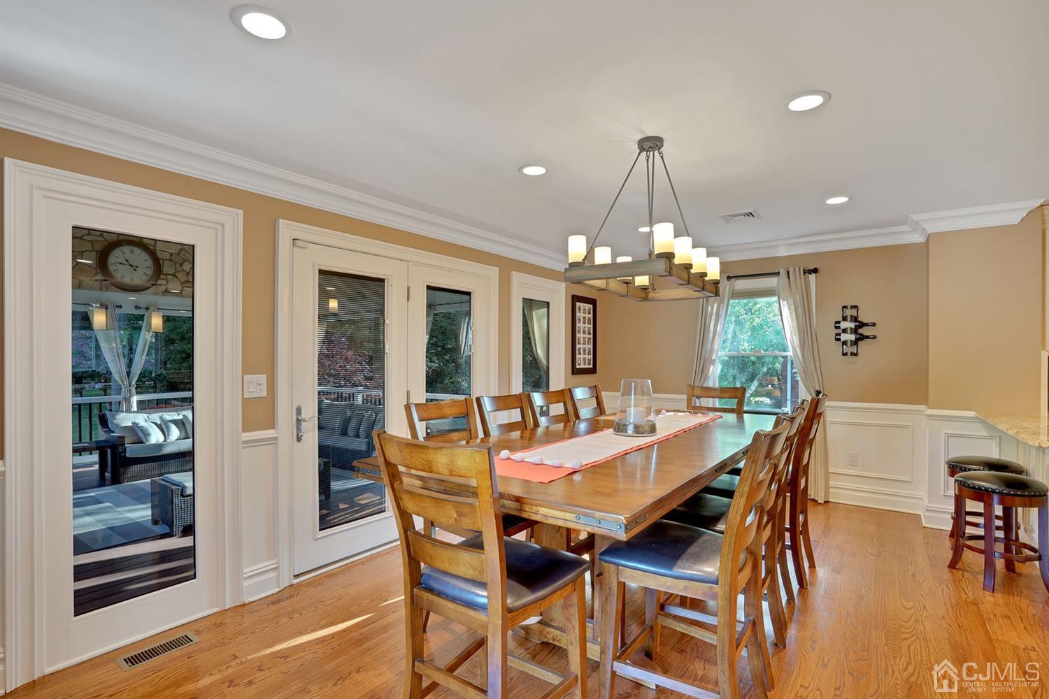 14 Fishel Road Edison, NJ 08820 - Photo 18 of 46 a view of a dining room with furniture window and wooden floor
