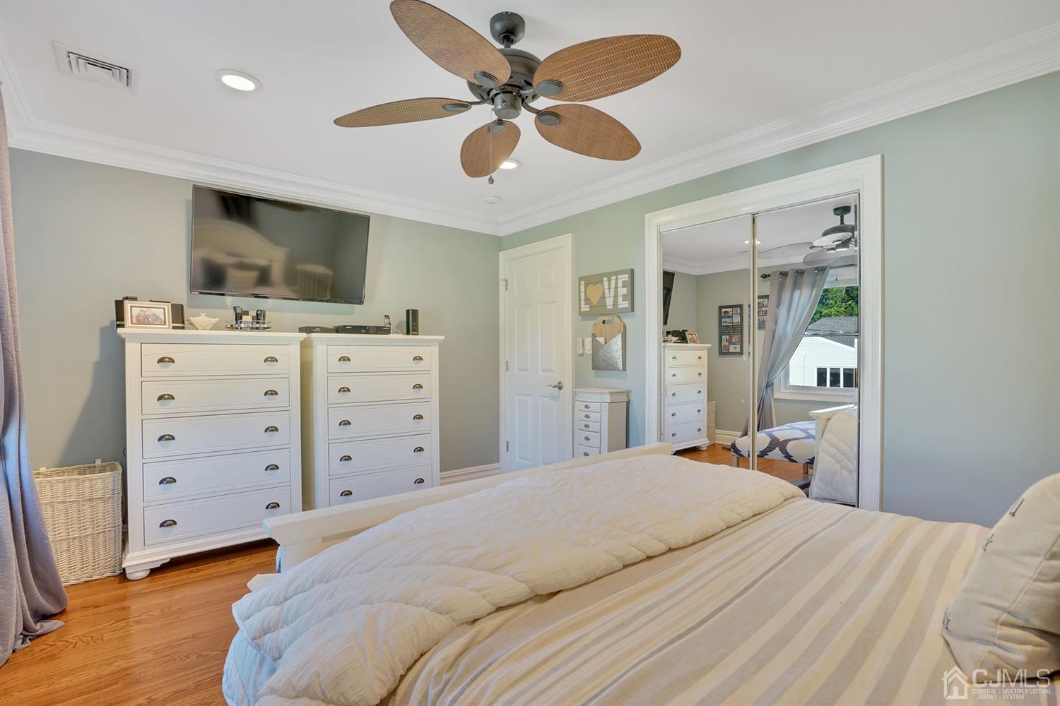 14 Fishel Road Edison, NJ 08820 - Photo 23 of 46 a bedroom with a bed and a dresser