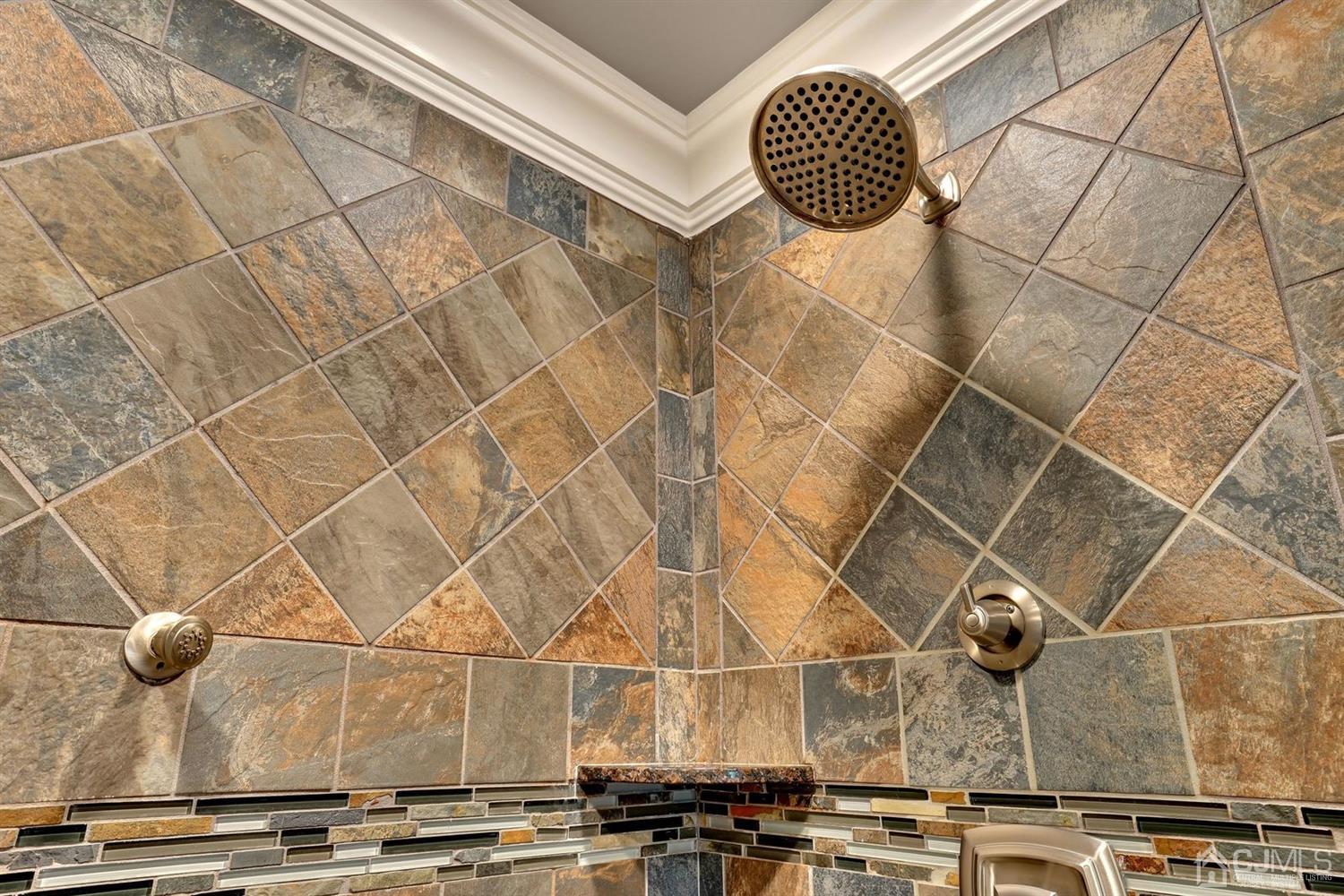 14 Fishel Road Edison, NJ 08820 - Photo 29 of 46 a bathroom with a sink and a shower