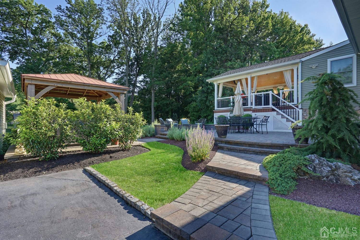14 Fishel Road Edison, NJ 08820 - Photo 37 of 46 a front view of a house with garden