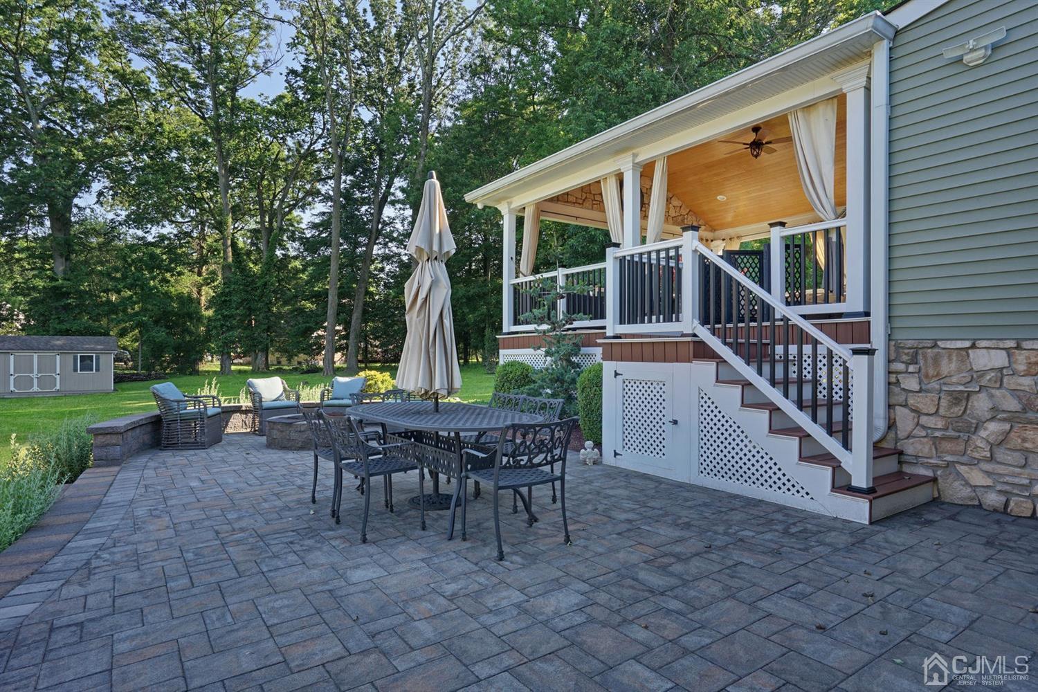 14 Fishel Road Edison, NJ 08820 - Photo 38 of 46 a view of a house with backyard and sitting area
