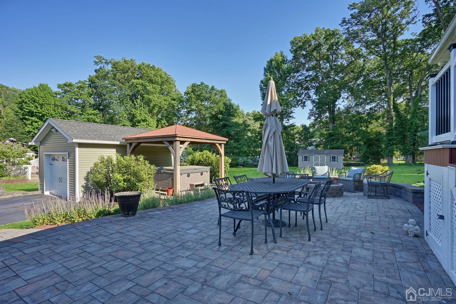 14 Fishel Road Edison, NJ 08820 - Photo 40 of 46 a view of a sitting area with furniture and garden
