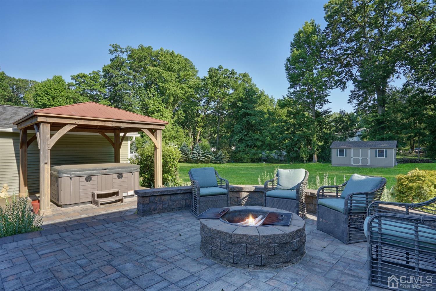 14 Fishel Road Edison, NJ 08820 - Photo 41 of 46 a backyard of a house with yard barbeque oven and outdoor seating