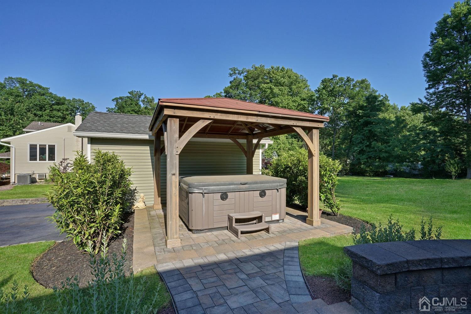 14 Fishel Road Edison, NJ 08820 - Photo 42 of 46 a view of backyard with barbeque grill and plants