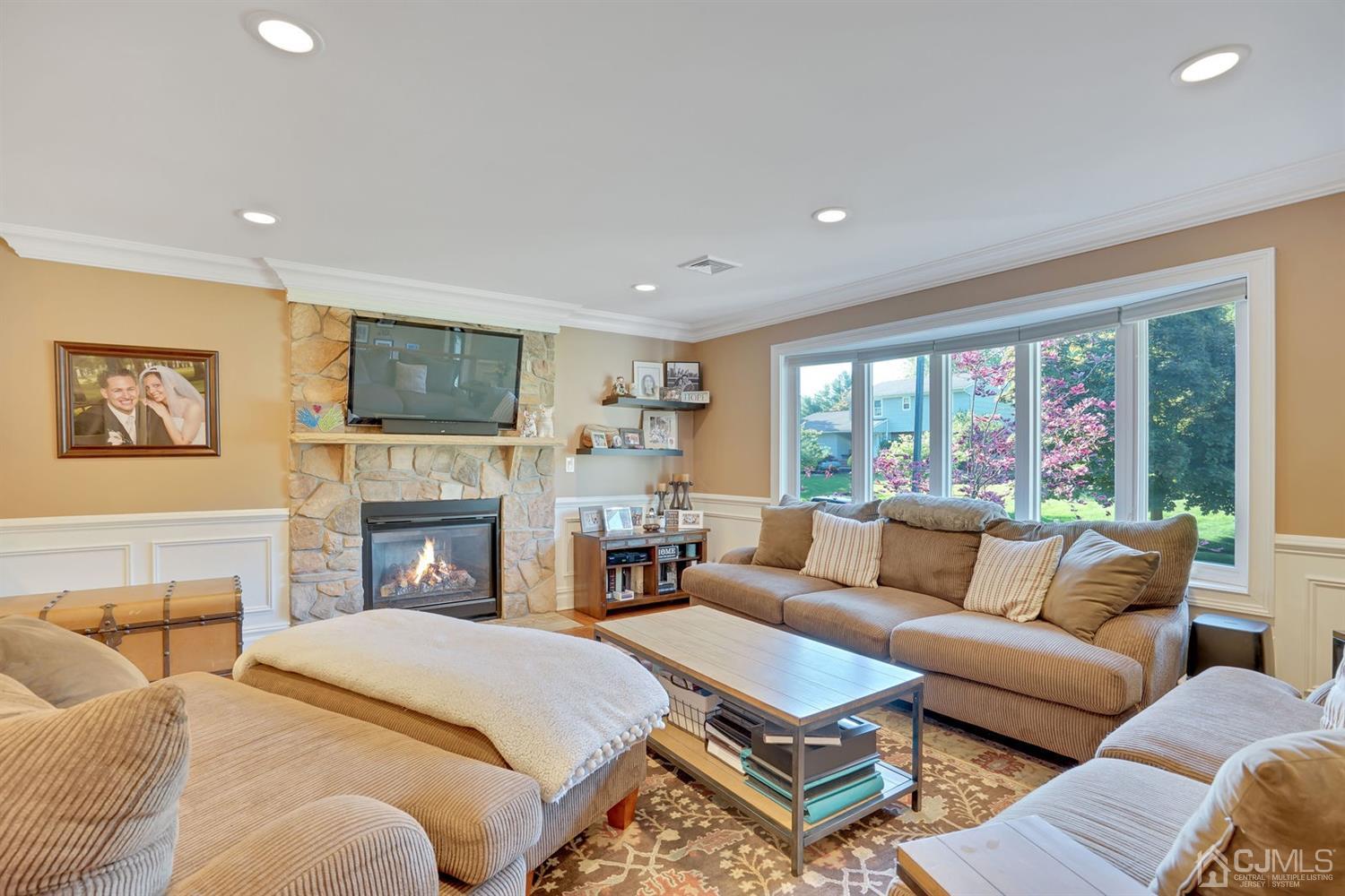 14 Fishel Road Edison, NJ 08820 - Photo 6 of 46 a living room with furniture fireplace and a large window