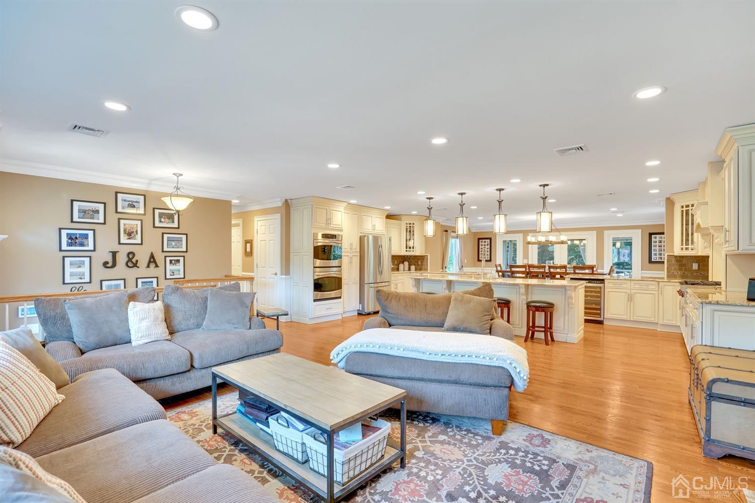 14 Fishel Road Edison, NJ 08820 - Photo 7 of 46 a living room with furniture and a view of kitchen