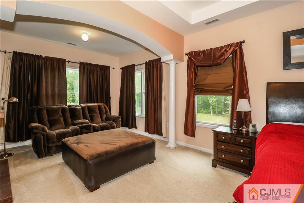 141 Westley Road Old Bridge, NJ 08857 - Photo 14 of 24 a bedroom with furniture and large windows