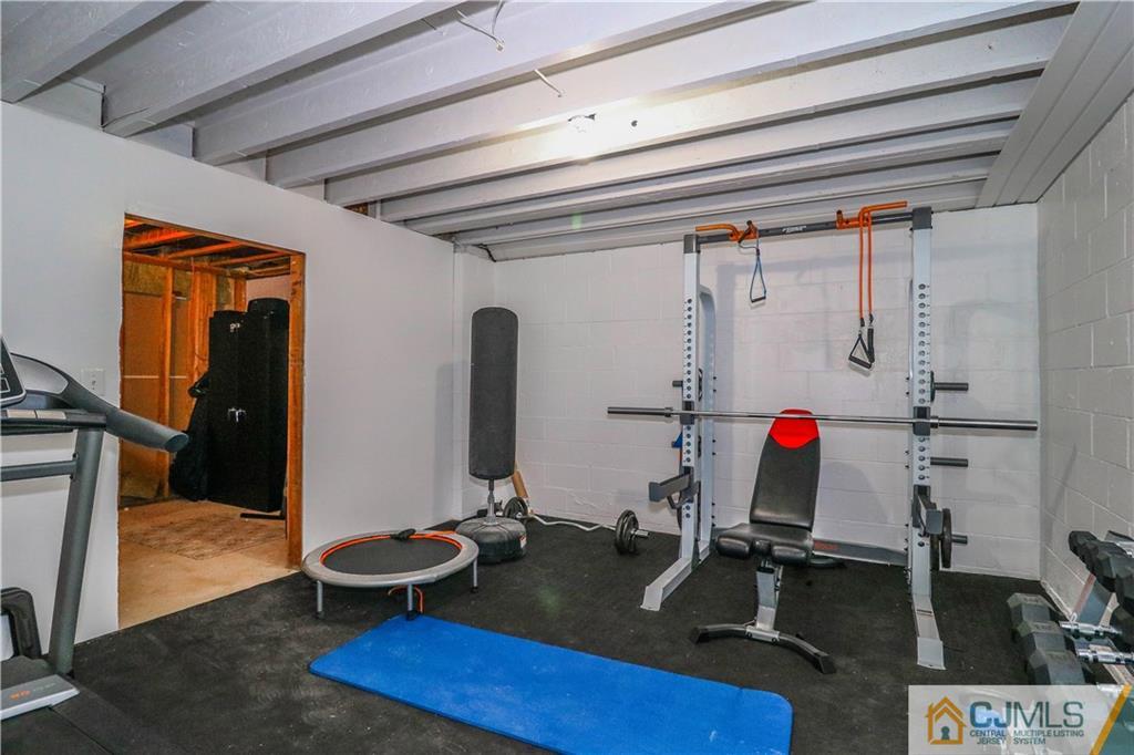 141 Westley Road Old Bridge, NJ 08857 - Photo 22 of 24 a view of a room with gym equipment