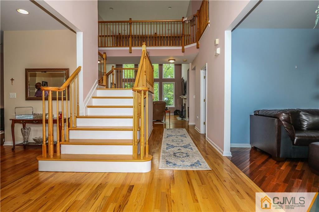 141 Westley Road Old Bridge, NJ 08857 - Photo 4 of 24 a view of entryway and hall with wooden floor