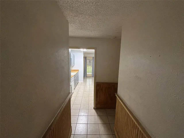 a view of hallway with stairs