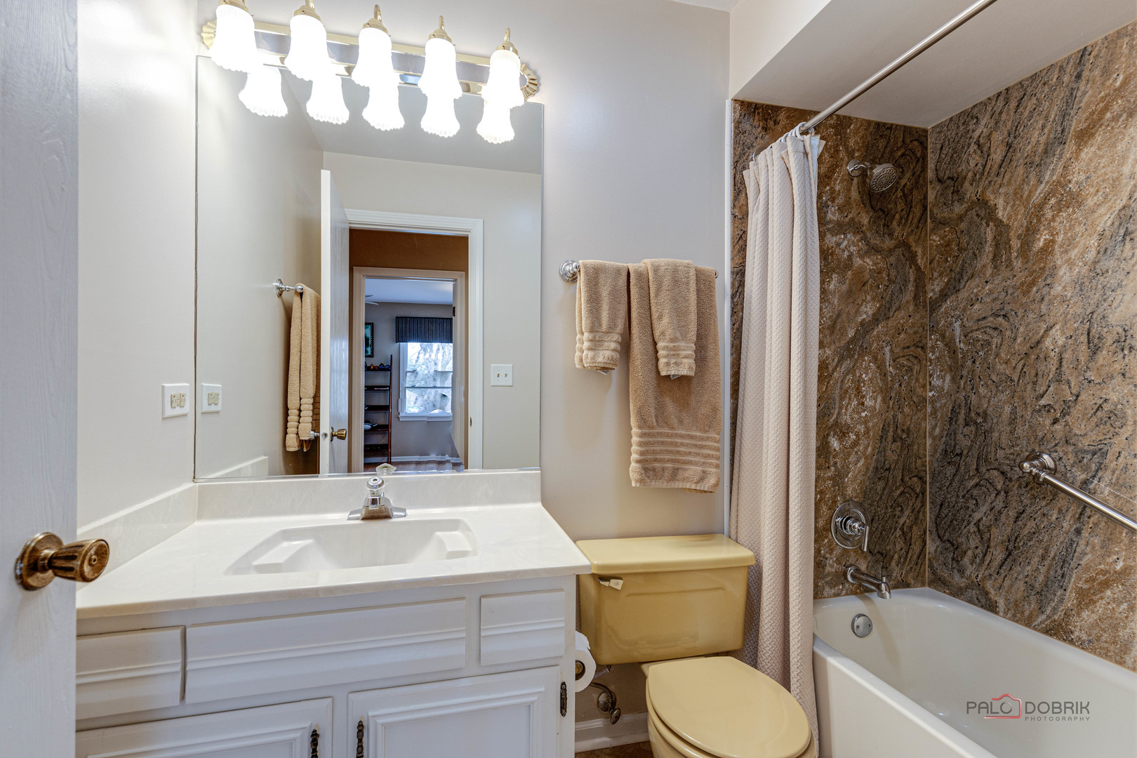 206 Pond Ridge Road Libertyville, IL 60048 - Photo 24 of 42 a bathroom with a sink toilet and shower
