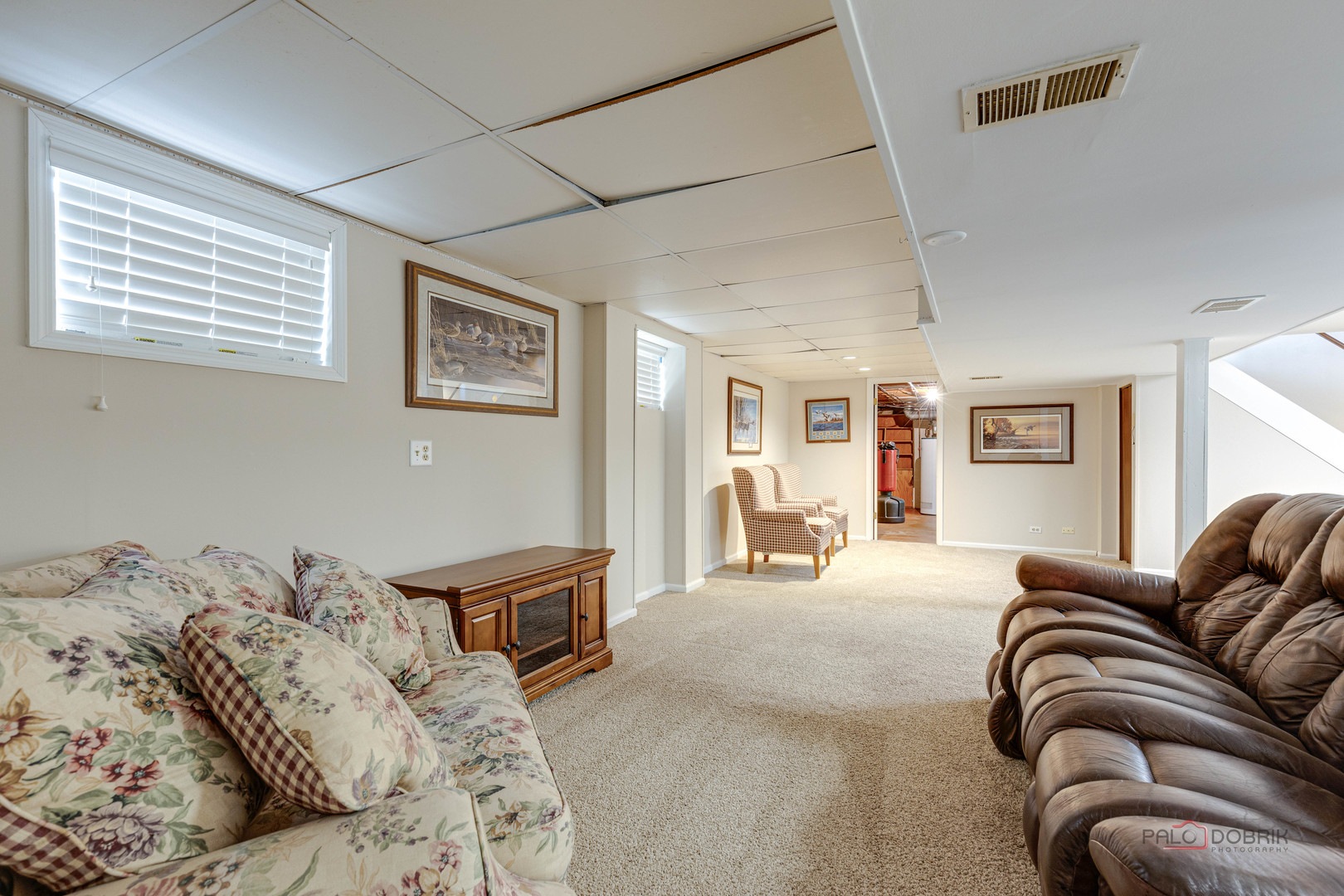 206 Pond Ridge Road Libertyville, IL 60048 - Photo 27 of 42 a living room with furniture and a large window