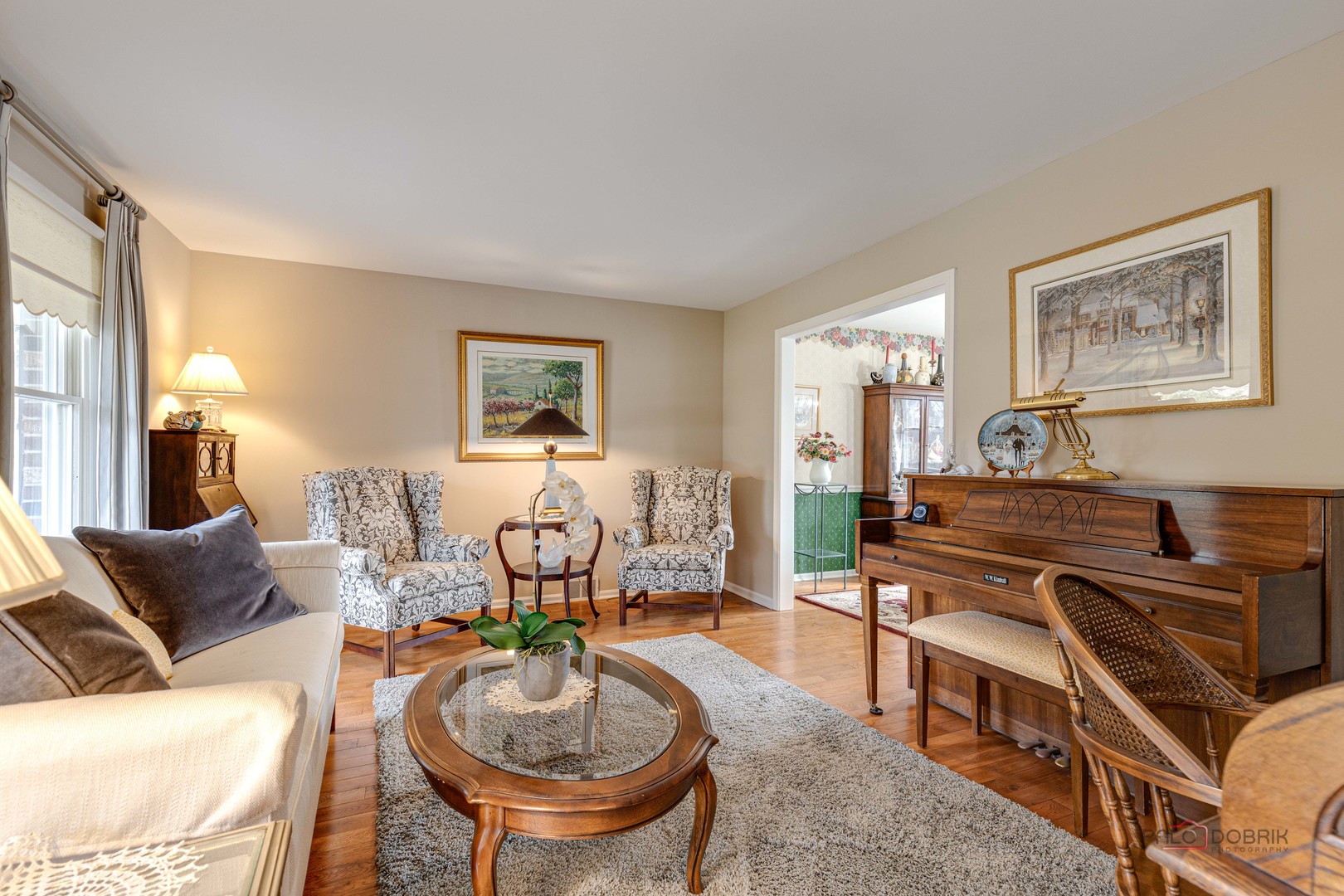 206 Pond Ridge Road Libertyville, IL 60048 - Photo 6 of 42 a living room with furniture a couch and a window