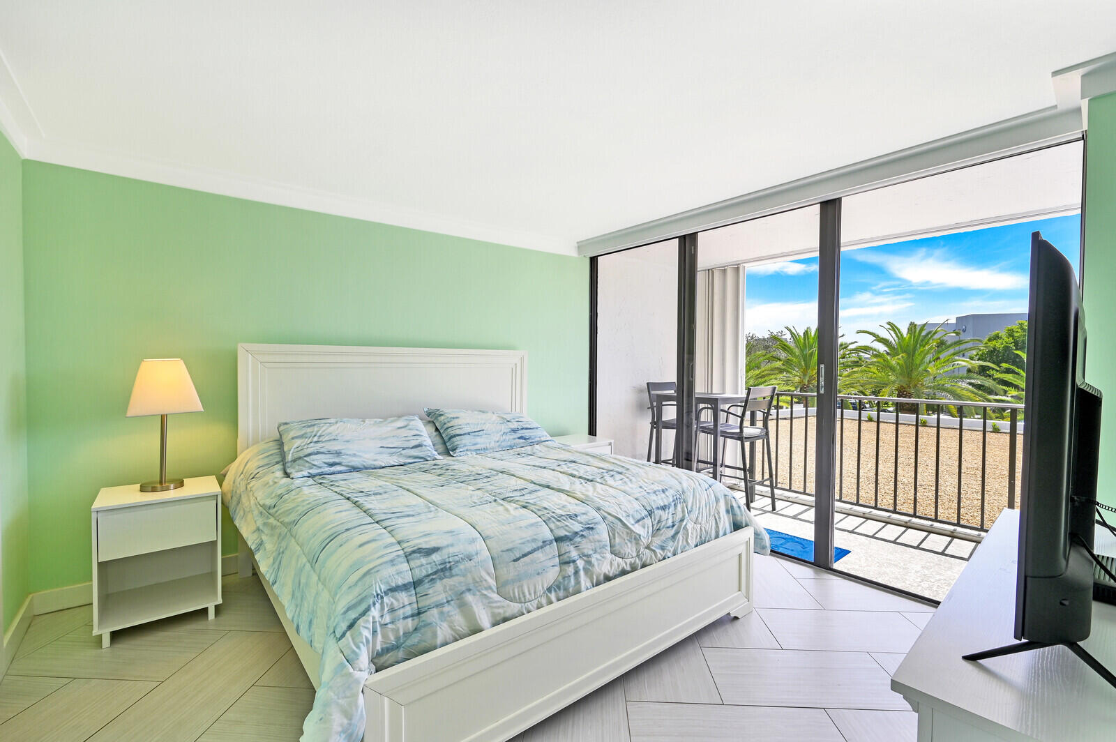 1300 Florida A1A, Unit 123 Jupiter, FL 33477 - Photo 15 of 41 Primary Bedroom w/Sliders to Balcony