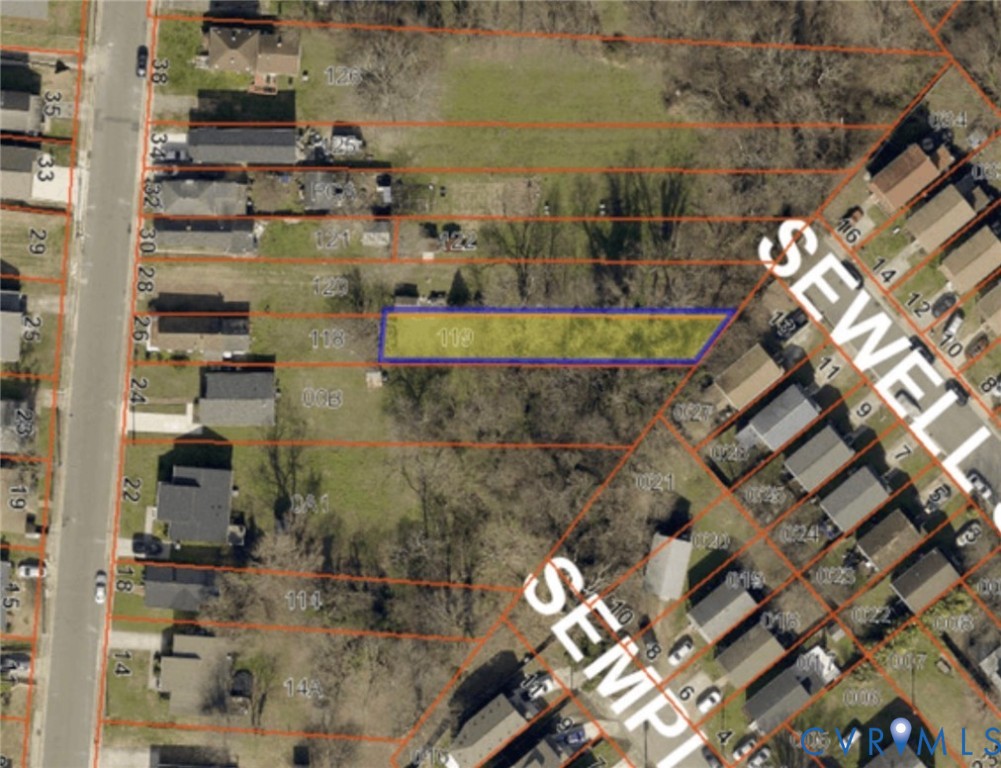 an aerial view of a house with a swimming pool