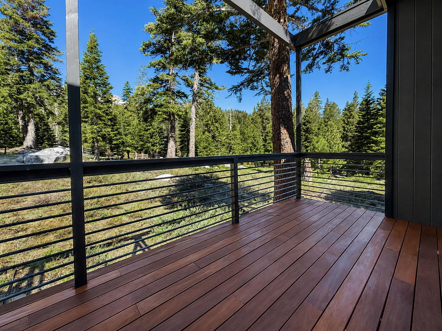 2570 Old Mammoth Road Mammoth Lakes, CA 93546 - Photo 10 of 39 Private outdoor deck featuring rich wood flooring, a cable railing system, and striking dark exterior siding