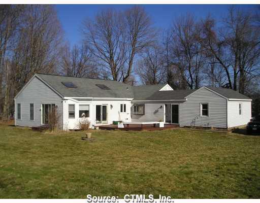 8 Dingle Brook Road Brookfield, CT 06804 - Photo 1 of 1 a front view of a house with a garden