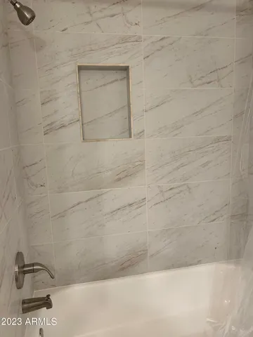 a bathroom with a bathtub