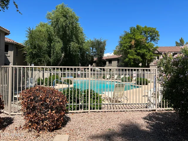 a view of a bench in the garden