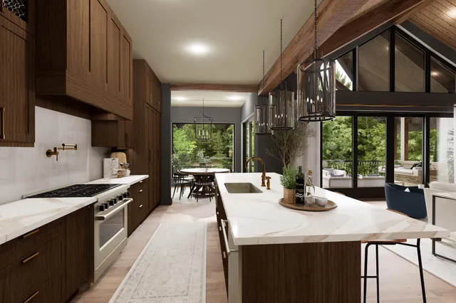 a kitchen with a stove a sink a dining table and chairs