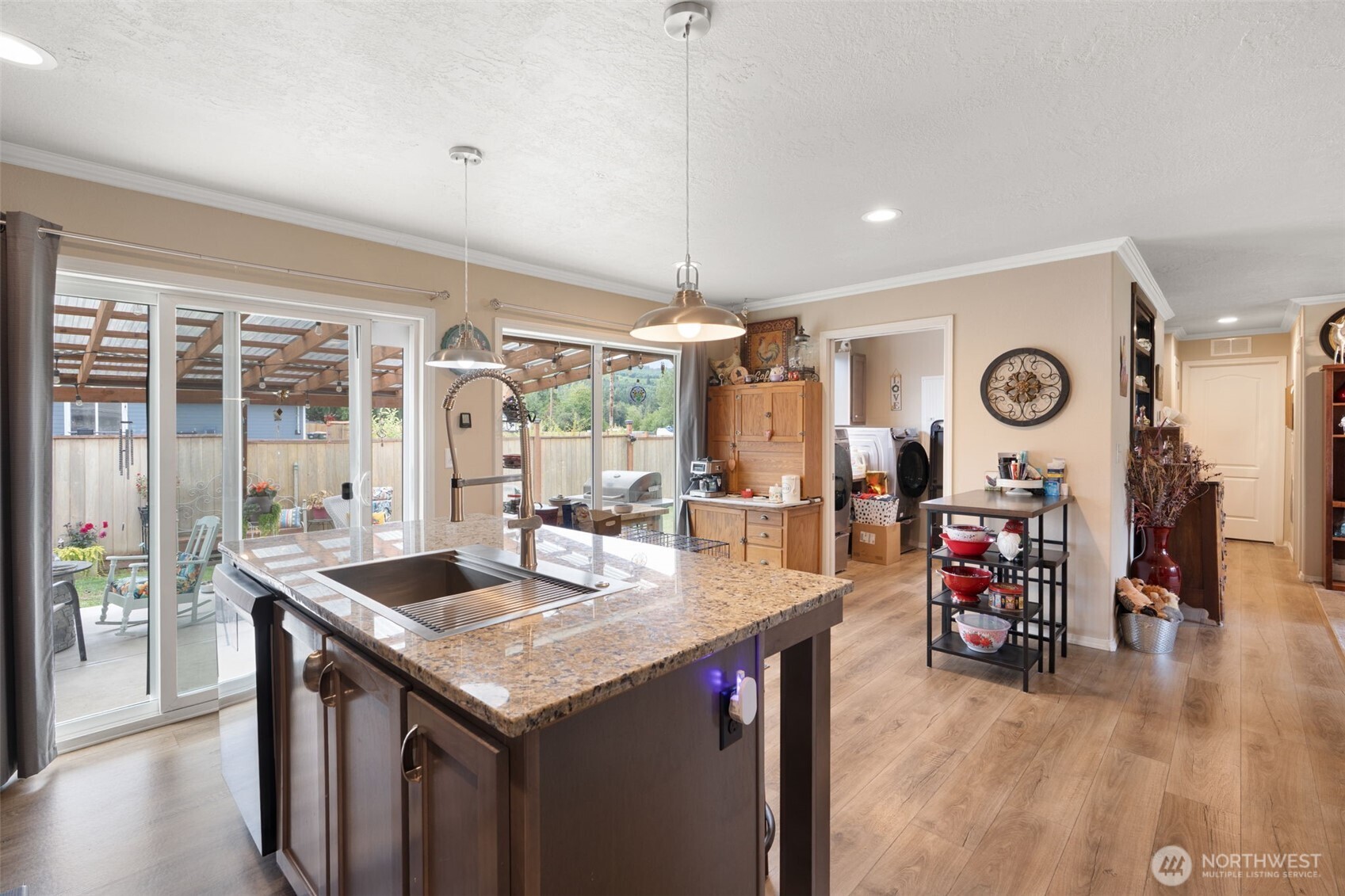 608 Main Street Vader, WA 98593 - Photo 13 of 37 a kitchen with a table chairs and wooden floor