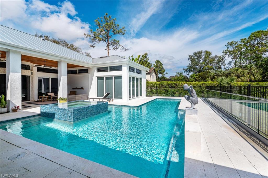 9240 The Lane Naples, FL 34109 - Photo 32 of 42 a view of a house with a yard