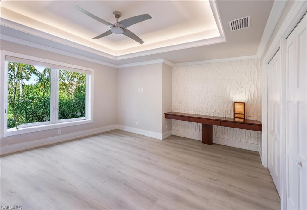 9240 The Lane Naples, FL 34109 - Photo 35 of 42 a view of an empty room with a window