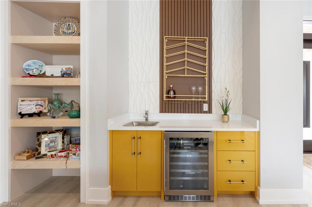9240 The Lane Naples, FL 34109 - Photo 9 of 42 a view of kitchen and window