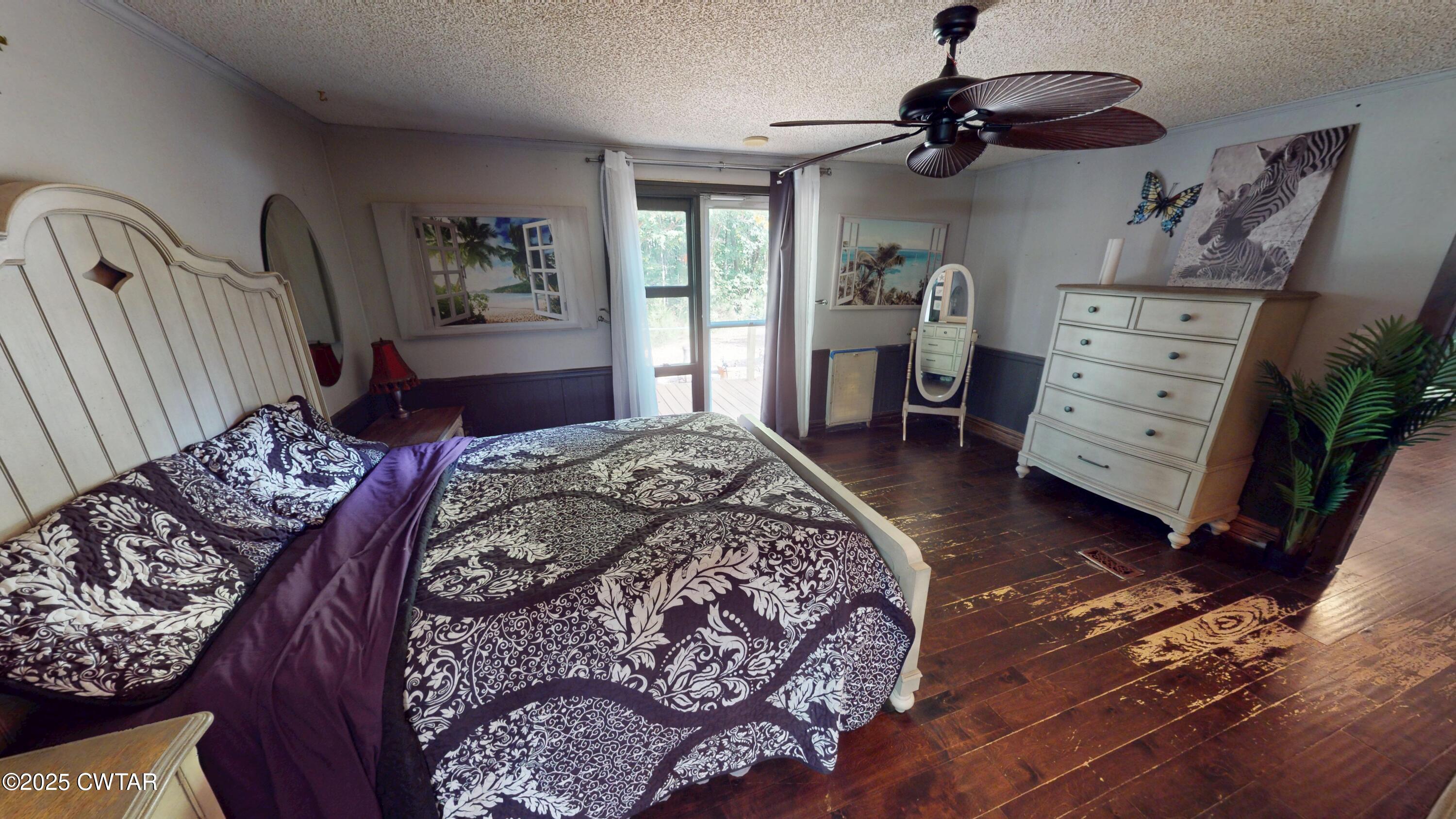 328 Cates Road Halls, TN 38040 - Photo 16 of 35 a bedroom with a large bed and a window