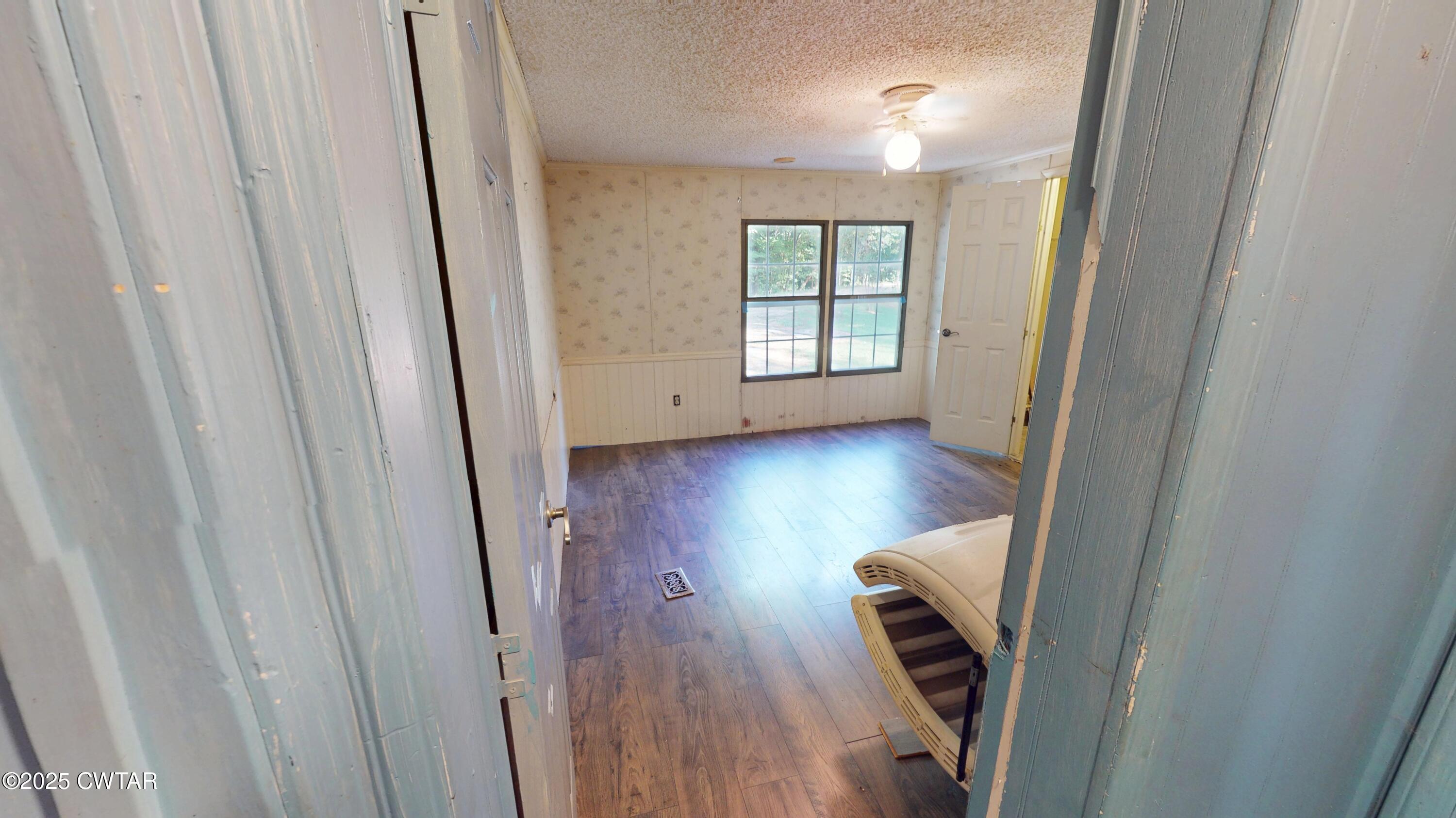 328 Cates Road Halls, TN 38040 - Photo 22 of 35 a view of hallway with wooden floor