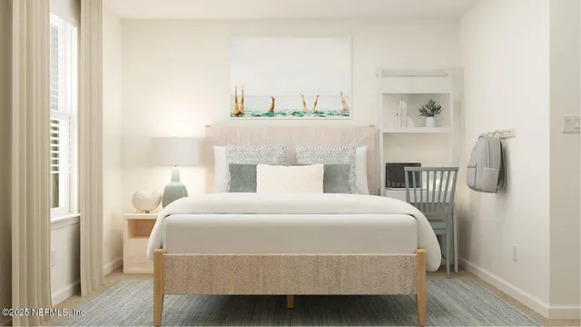 a bedroom with a bed and a potted plant