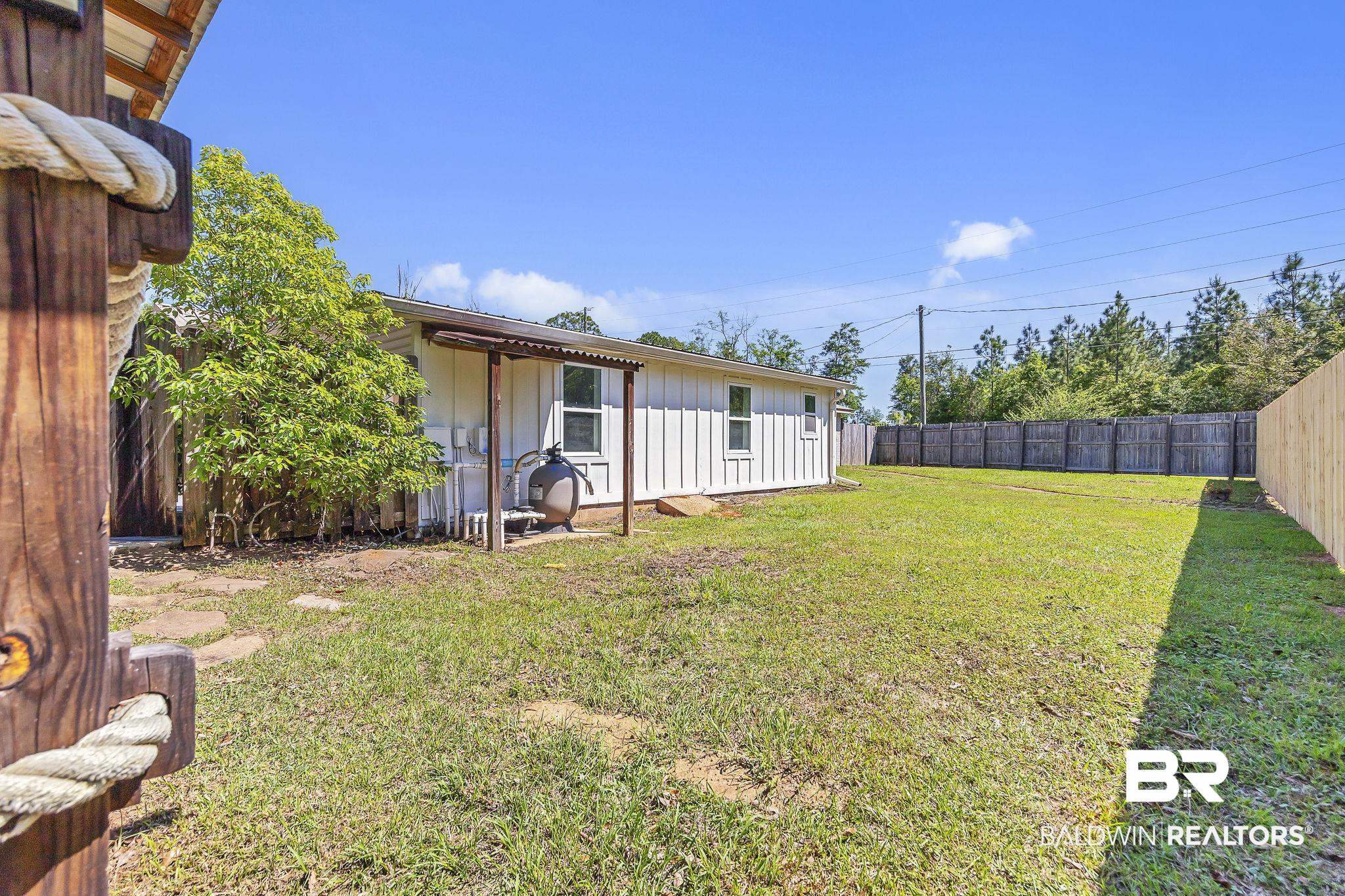 11964 Stroh Road Daphne, AL 36527 - Photo 49 of 58 View of yard with a fenced backyard